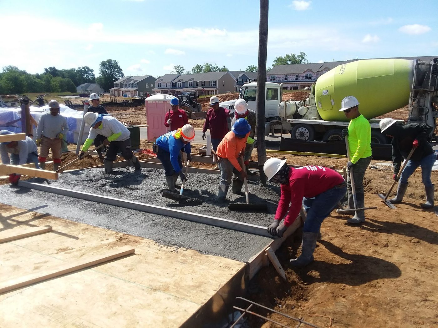 A full construction crew working together on site